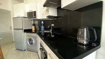 Microwave, oven, cookware/dishes/utensils