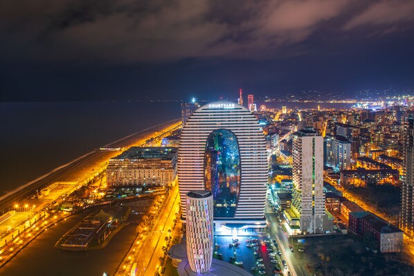 Front of property - evening/night - Orbi City Hotel Official (Batumi)