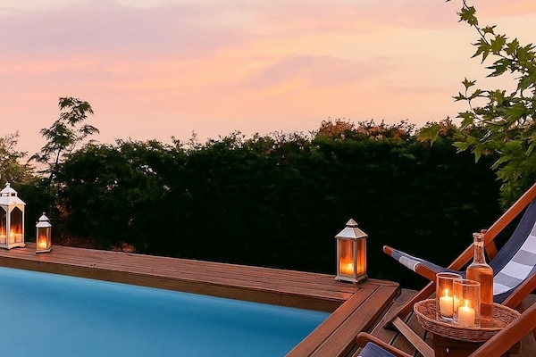 Private Pool at Sunset – A serene pool illuminated by soft evening light, perfect for a refreshing dip or a romantic swim under the sky.