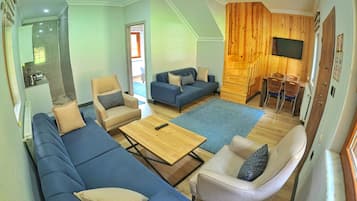 Deluxe villa | Nappali | Síkképernyős tévé