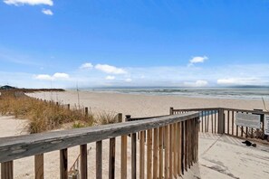 Walk along the boardwalk to the serene ocean view.