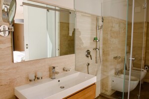 Hair dryer, towels, soap, shampoo