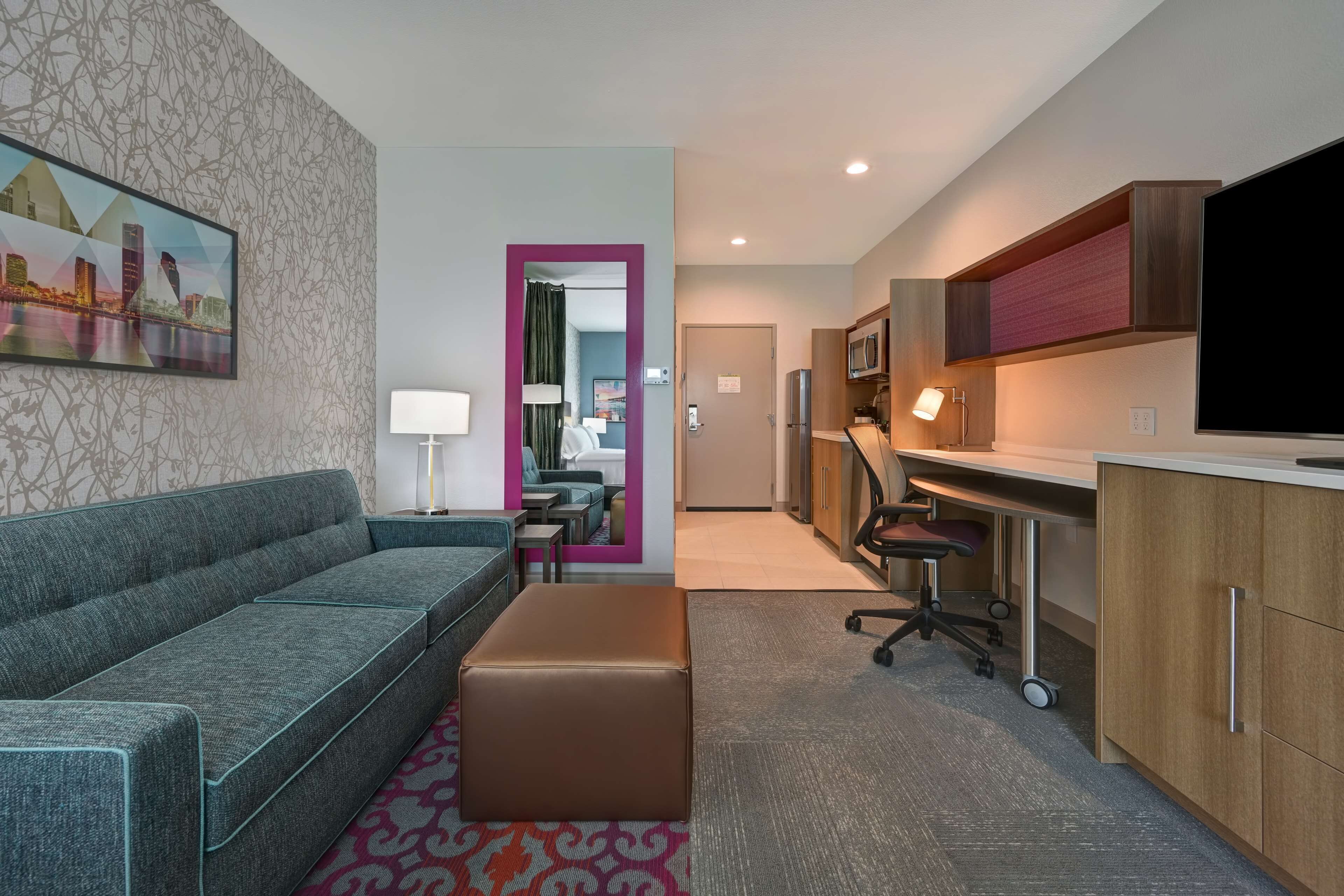 studio, 2 queen beds, non smoking | living area | 55-inch flat-screen tv with cable channels, tv