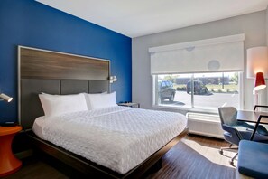 Tabla de planchar con plancha, wifi gratis y ropa de cama 