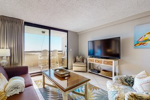 Relax on the balcony with a view of the sky from the sliding glass door, or unwind in the room with a flat-screen TV and comfortable seating.