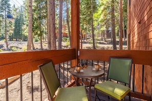 Relax on the deck with a cup of tea, taking in the serene views of the surrounding forest.