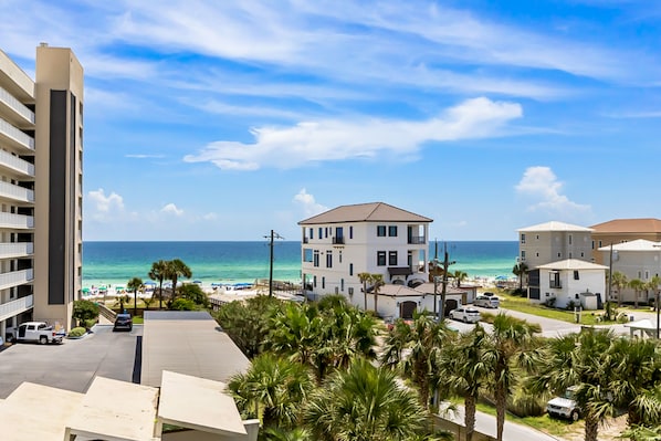 Enjoy stunning ocean views from the upper-floor balcony.