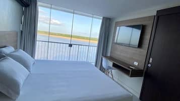 Habitación Deluxe | Colchones con acolchado adicional, minibar, wifi gratis y ropa de cama