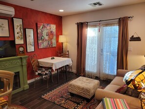 TV, fireplace, books, stereo