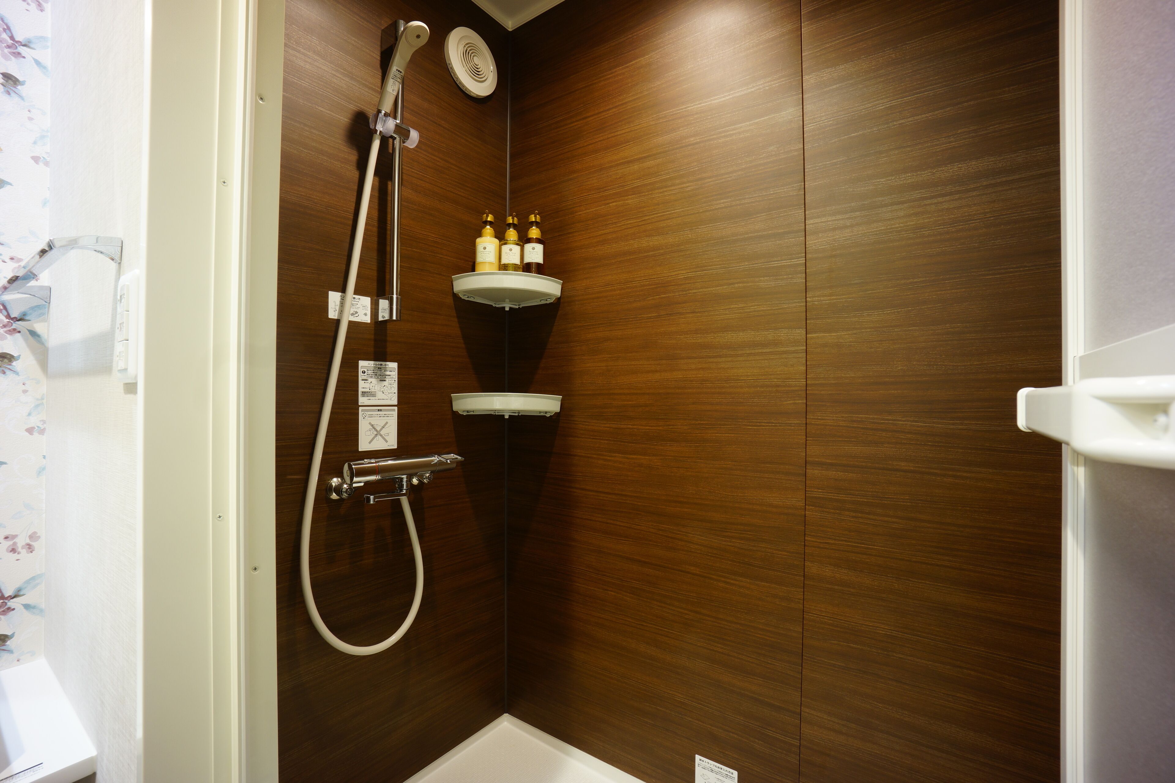 deluxe quadruple room | bathroom | shower, hair dryer, slippers, electronic bidet