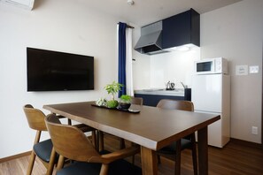 Quarto quádruplo luxo | Opções para refeição no quarto