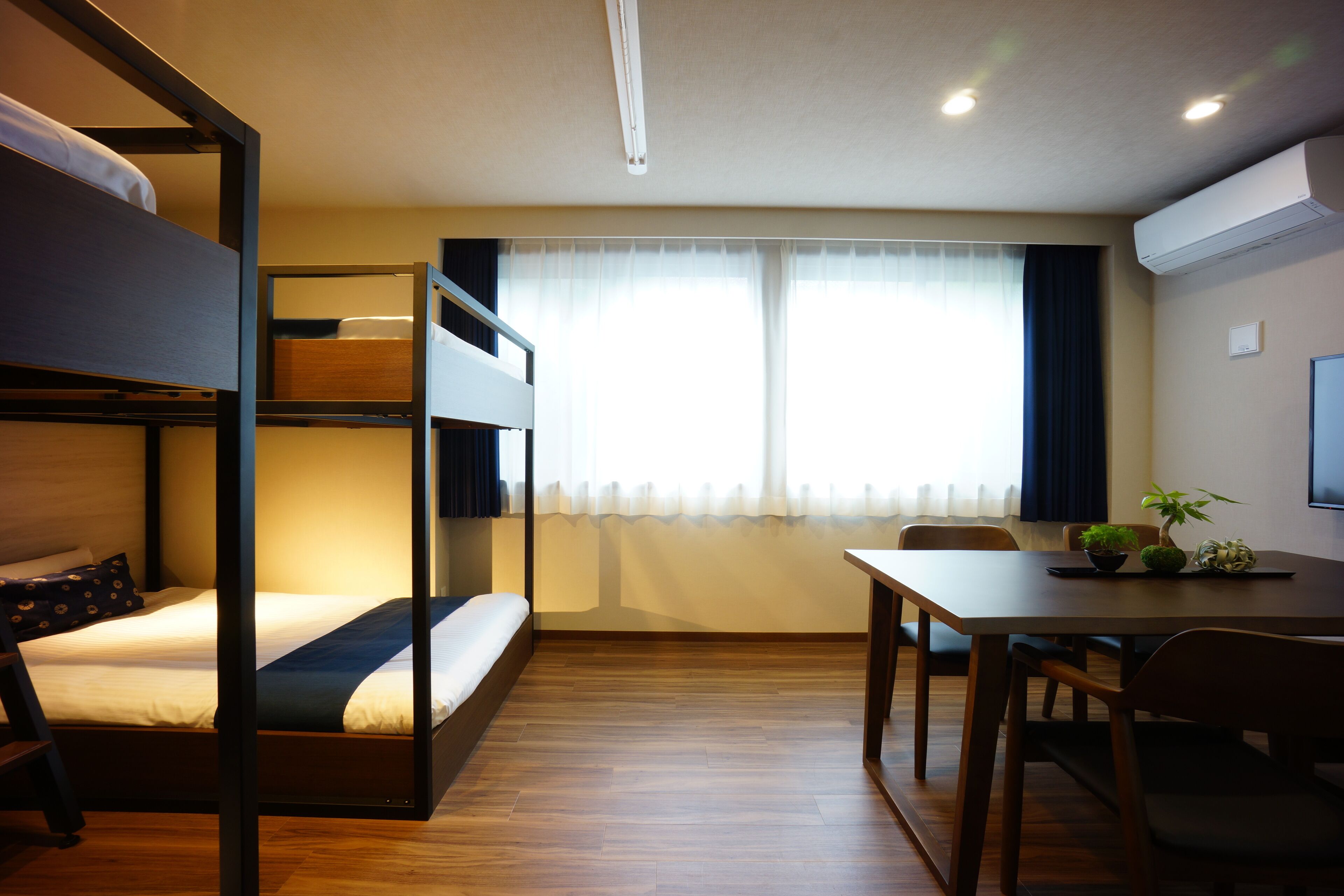 deluxe quadruple room | 1 bedroom, desk, laptop workspace, iron/ironing board
