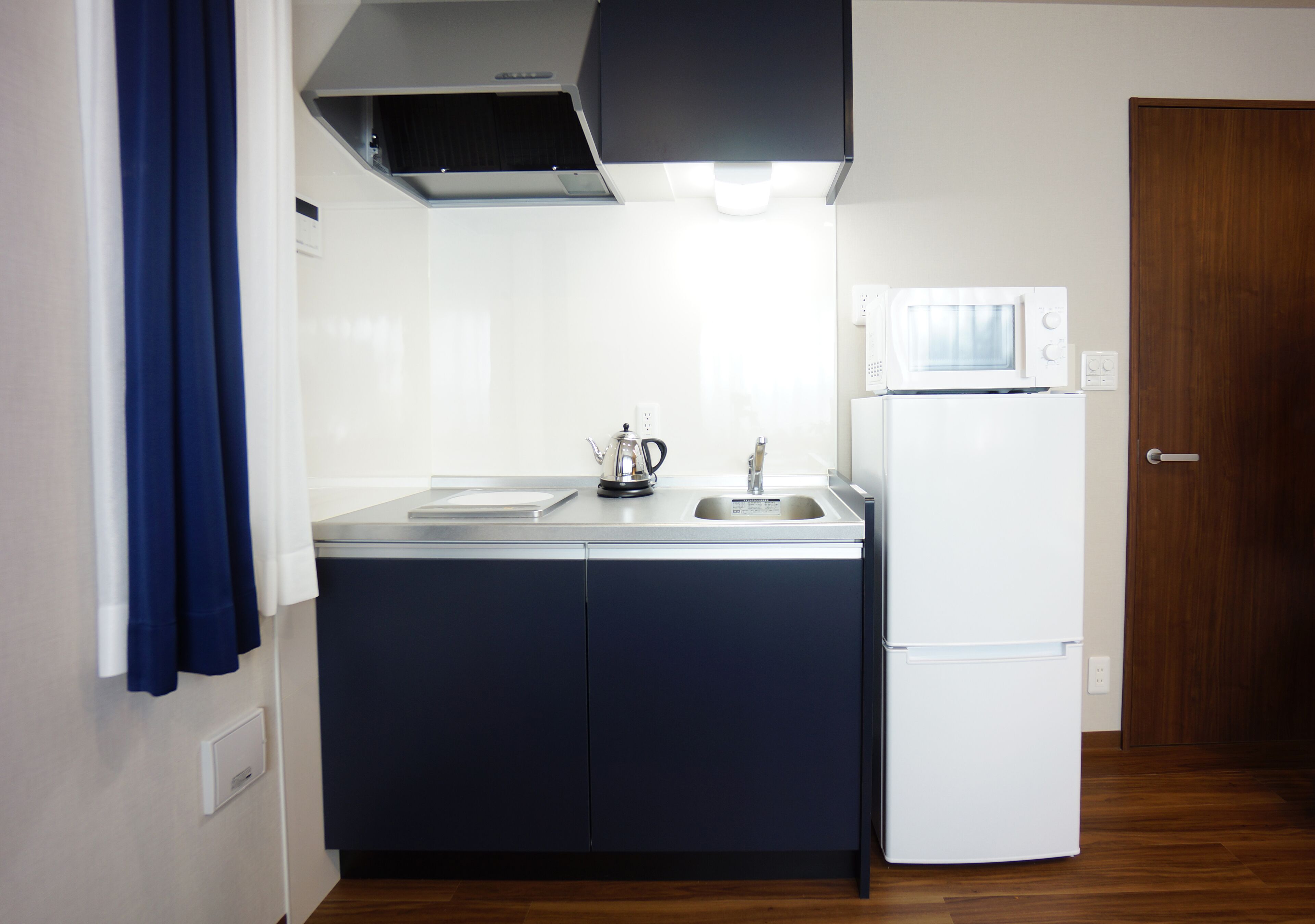 deluxe quadruple room | private kitchenette | fridge, microwave, stovetop, electric kettle