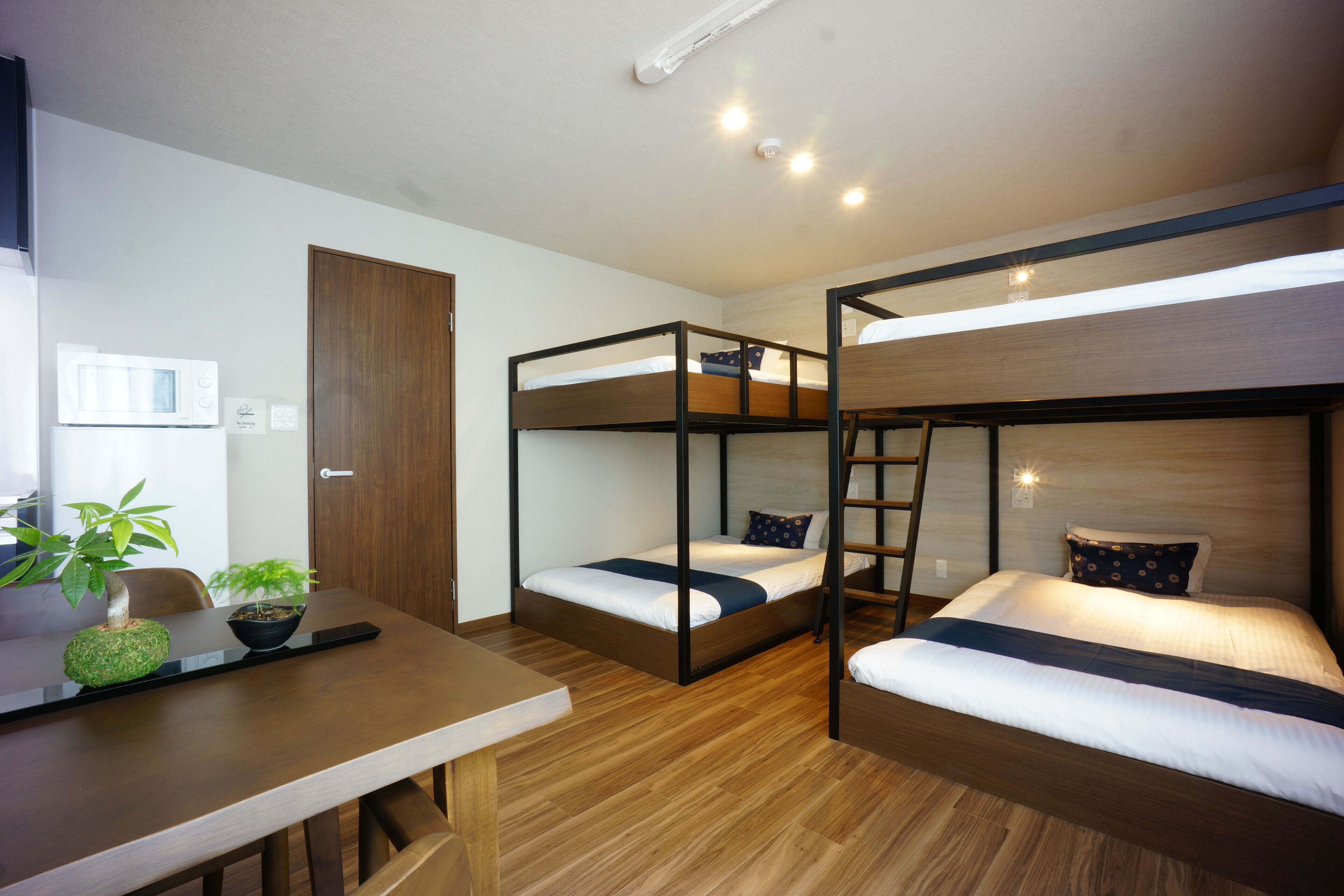 deluxe quadruple room | 1 bedroom, desk, laptop workspace, iron/ironing board