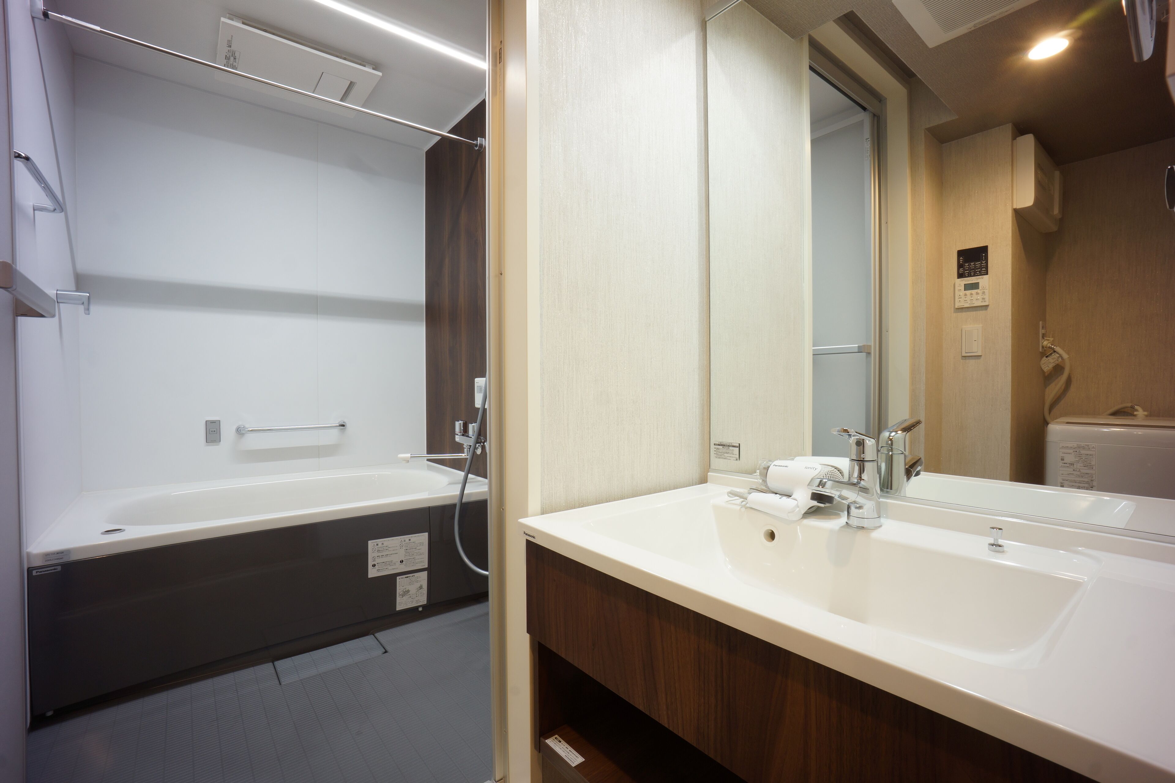room for 5 people | bathroom | separate bathtub and shower, hair dryer, slippers, electronic bidet