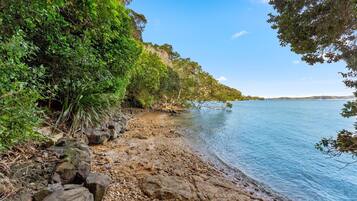 On the beach, sun loungers, beach towels