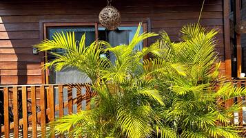 Cabaña romántica, 1 cama King size, vista al jardín (Holboxena) | Terraza o patio