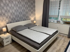 1 quarto, berço de viagem, Wi-Fi de cortesia, roupa de cama