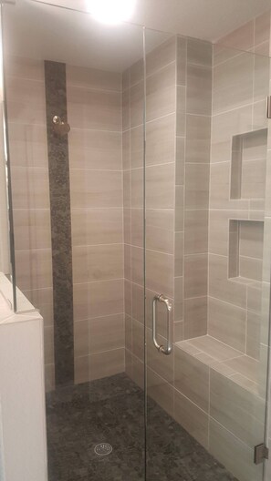 Combined shower/tub, hair dryer, towels, soap
