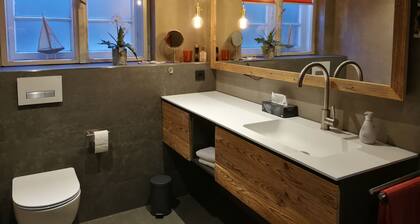 Cozy, high-quality apartment with a large south-facing terrace and a view of the garden