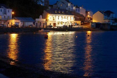 Riverside retreat by Brunel’s Bridge, balcony view, off‑road parking, EV charger