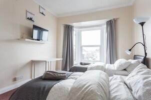 Traditional Triple Room (Extra Large Bed) | Iron/ironing board, free WiFi, bed sheets