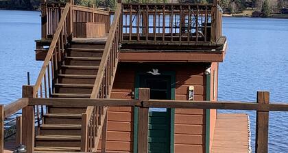 Waterfront Camp with Boathouse - Wifi, kayaks, canoe and sandy bottom out front.