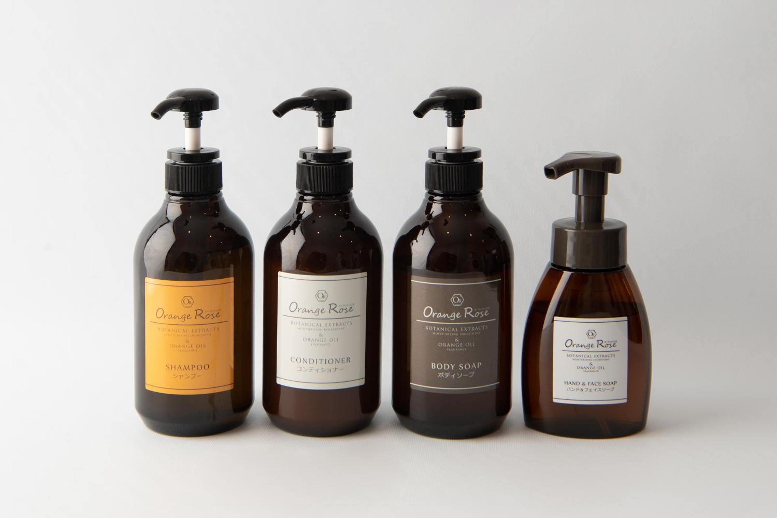 Four bottles of Orange Rose products.