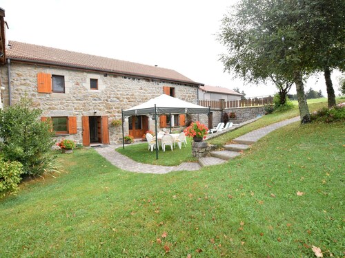 Detached Cottage Situated in a Wooded Area on the Edge of Nature