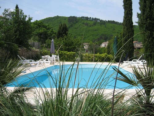 3 Cottages Around a Swimming Pool in a Small Village