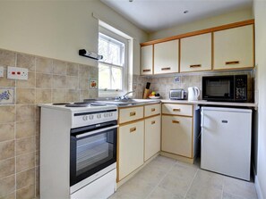 Fridge, microwave, stovetop - Rose Cottage is set in Beautiful Surroundings in Barden (Leyburn)