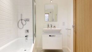 Baño | Bañera y toallas