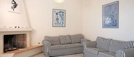 Villa | Living room | Fireplace