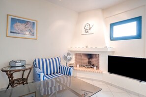 Villa | Living room | Fireplace