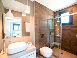 Villa | Bathroom | Hair dryer, towels