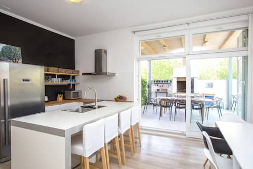 Villa | Private kitchen | Stovetop, coffee/tea maker, highchair, cookware/dishes/utensils