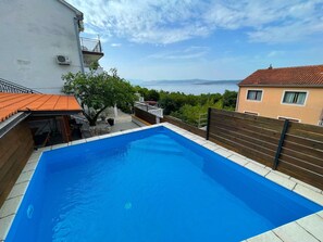 Huis | Zwembad | Een binnenzwembad, een buitenzwembad