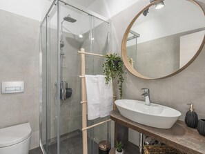 Bathroom | Shower, hair dryer, towels