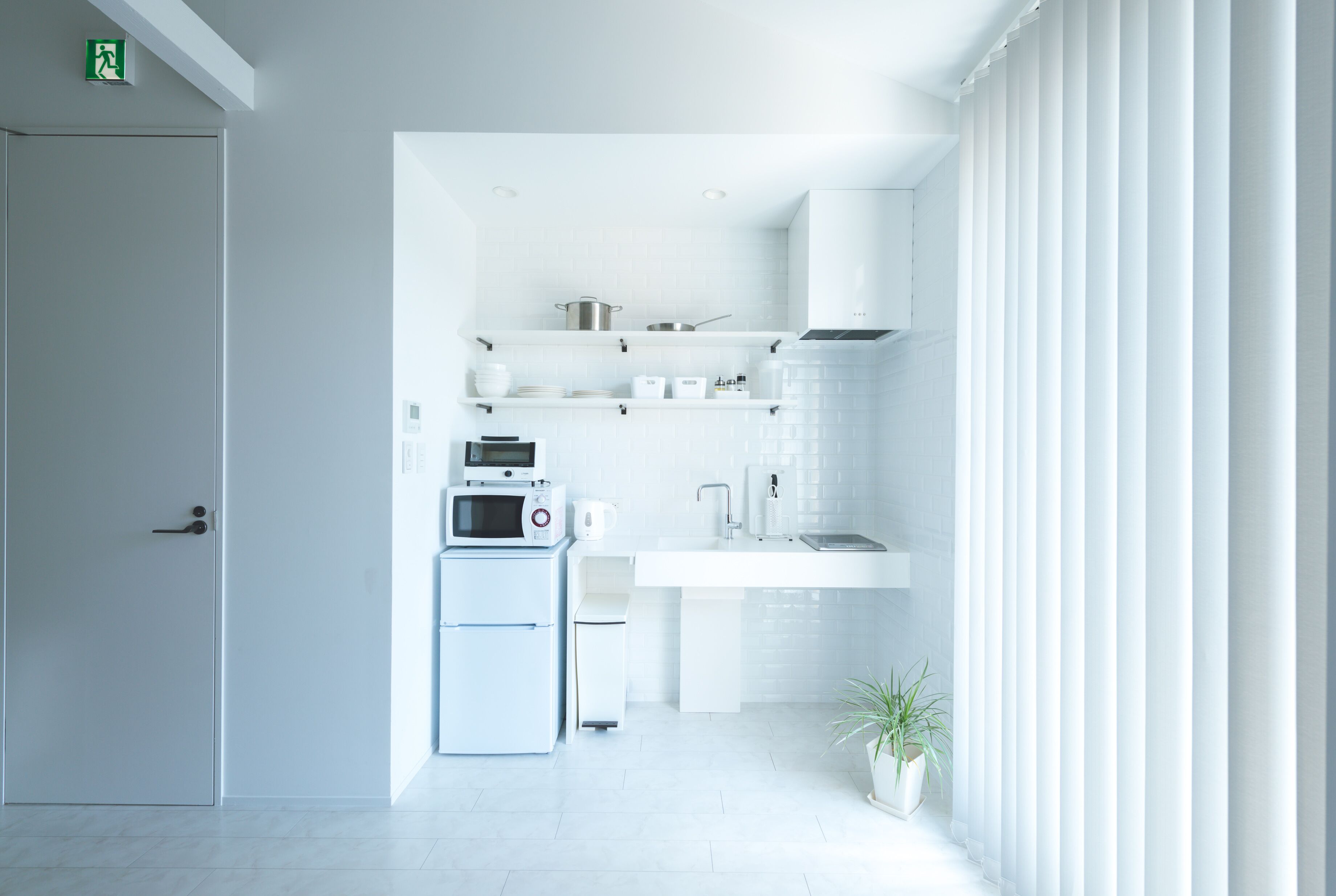 fridge, microwave, stovetop, electric kettle