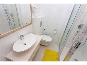 House | Bathroom | Bathtub, hair dryer, towels