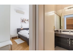House | Bathroom | Bathtub, hair dryer, towels