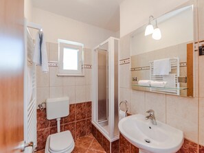 Villa | Bathroom | Hair dryer, towels
