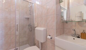 House | Bathroom | Bathtub, hair dryer, towels