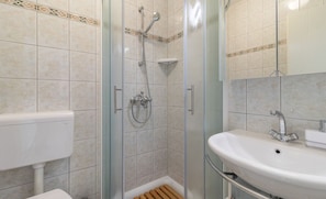 House | Bathroom | Bathtub, hair dryer, towels