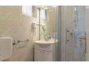 House | Bathroom | Bathtub, hair dryer, towels