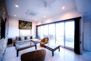 Casa (Private Vacation Home) | Área de estar | TV de tela plana