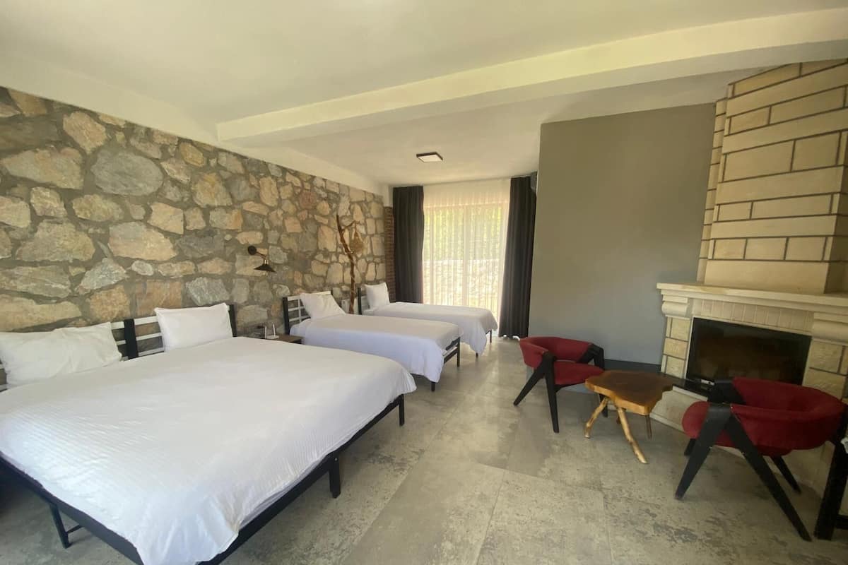 Standard Quadruple Room | Select Comfort beds, desk, laptop workspace, free WiFi