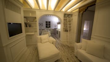 Deluxe Apartment, 2 Bedrooms | Living area | 40-inch flat-screen TV with digital channels, TV