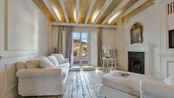 Deluxe Apartment, 2 Bedrooms | Living area | 40-inch flat-screen TV with digital channels, TV