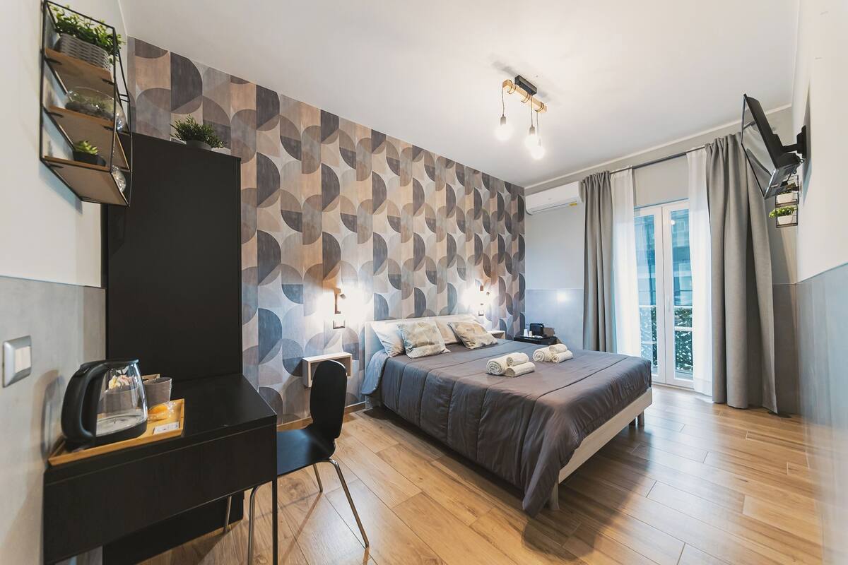 Comfort Double Room, Balcony, City View (Puglia) | Pillow-top beds, minibar, desk, laptop workspace